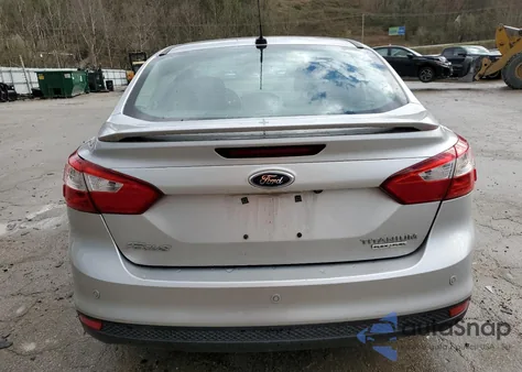 2014 Ford Focus Titanium from USA, damaged, VIN 1FADP3J2XEL222328